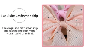 Close-up of handmade grosgrain hair bow with sparkling rhinestones and ribbon texture