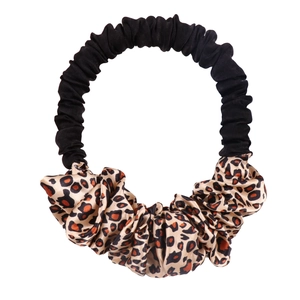 Close-up of a leopard print fabric heatless hair curler and scrunchie with soft texture