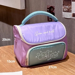 Detail showing the 27x15x20cm dimensions of this purple and teal makeup storage bag