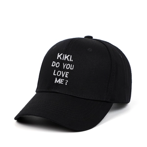 Black cotton baseball cap featuring white KIKI DO YOU LOVE ME embroidered text design