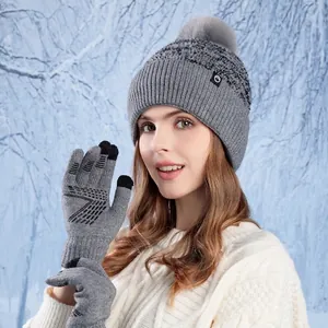 Winter gray knitted beanie with faux fur pom and touchscreen gloves set for women
