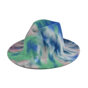 Detailed top view of a colorful tie-dye fedora hat with a classic wide brim and wool felt texture