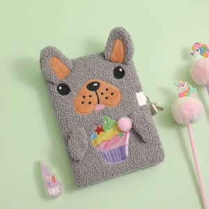 Detail view of grey plush dog diary with a colorful cupcake patch and metal lock