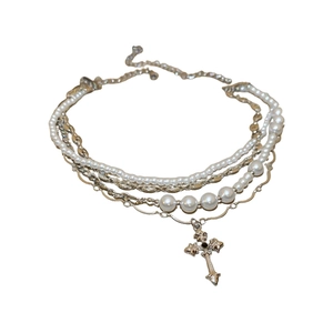 Multi-layer necklace with pearls, silver metal chains and rhinestone cross pendant