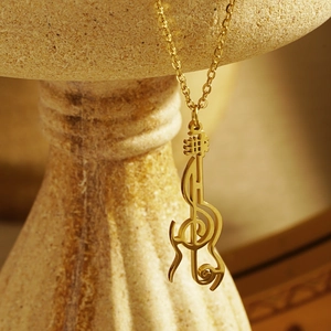 Creative golden violin and musical note pendant necklace with polished metal finish
