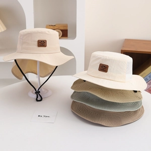 Detail of quick-dry kids sun hats with neck flaps and windproof chin straps