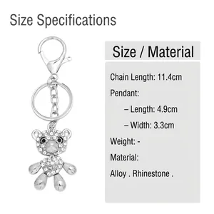 Silver rhinestone-encrusted bear keychain with heart detail and secure lobster clasp