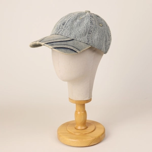 Retro light blue washed denim baseball cap with creative layered brim and vintage look