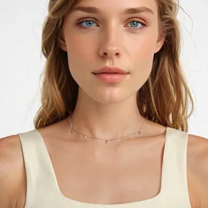 Minimalist S925 sterling silver star necklace with dangling zircon tassels on a model