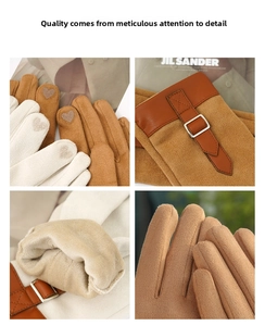 Detail view of warm suede gloves with heart touchscreen embroidery and fleece lining