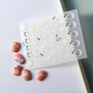 5D embossed nail stickers featuring white floral patterns and daisies style TS-213