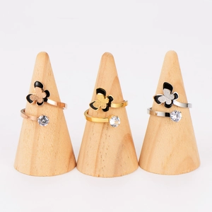 Three minimalist butterfly stainless steel rings in rose gold, gold and silver finishes