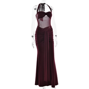 Close-up detail of the halter neck knot and ruched fabric on this elegant burgundy maxi dress