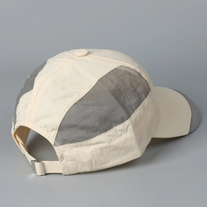 Close-up of mesh splicing and adjustable metal buckle on back of quick-dry baseball cap