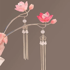 Handmade Chinese style lotus hair pin with glowing pink petals and long gold tassels