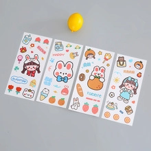 Detailed view of four sheets of cute hand-drawn cartoon stickers for planners and glass bottles