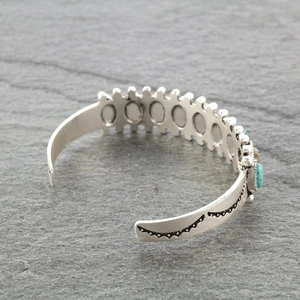Bohemian style open cuff bracelet with vintage engravings and turquoise stones