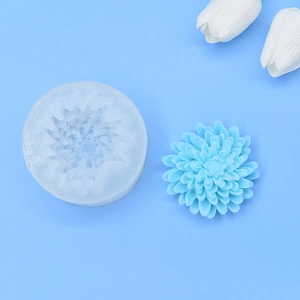 Macro shot of 3D floral silicone mold with detailed chrysanthemum petal textures for DIY craft