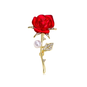 Elegant red rose brooch with gold leaves, sparkling crystals and a white pearl accent