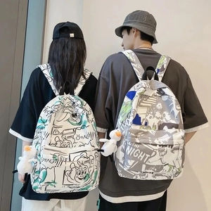 Graffiti printed waterproof backpacks for couples with cute bird plush keychains