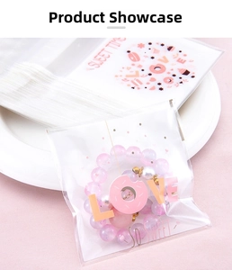 Detailed view of pink heart donut self-adhesive bags used for bead bracelet packaging