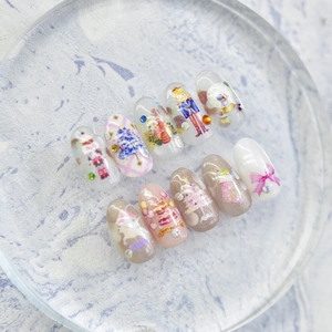 Exquisite handmade Christmas press-on nails with nutcracker and 3D pearl decorations