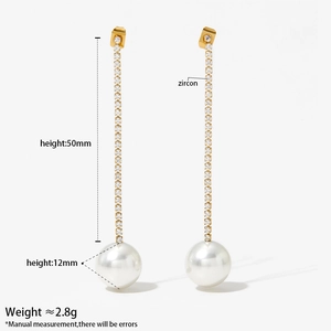 Elegant gold drop earrings featuring sparkling zircon chain and large white pearls