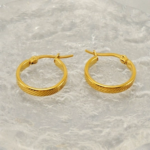 Elegant gold textured round hoop earrings in polished stainless steel for women