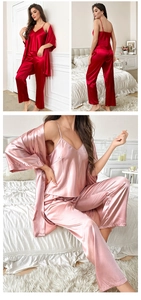 Detailed view of women's 3-piece silk pajama set with satin robe and camisole in burgundy