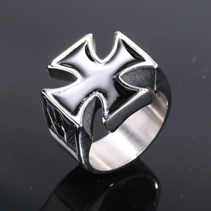 Macro shot of retro lightning cross ring in polished steel with black enamel finish