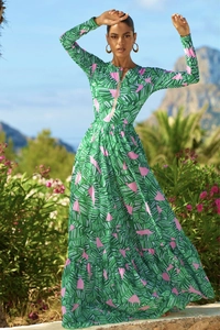 Close-up of tropical leaf print long sleeve dress with zip neck and high waist detail
