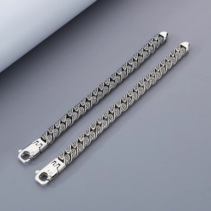 Vintage silver titanium steel bracelet with carved patterns and spring lobster clasp