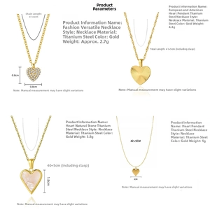 Detail of four gold titanium steel heart pendants with shell and diamond-like textures
