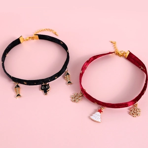 Adjustable velvet pet collar with gold stars and festive pendants in black and red