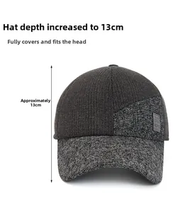 Detail view of 13cm depth on a gray knitted baseball cap with ear flaps and brand label