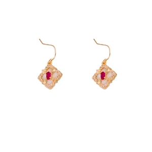 Vintage gold-plated drop earrings featuring white pearl base and red oval zircon stones