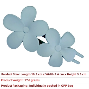 Detail view of matte light blue flower hair claw clip with specific dimensions and weight