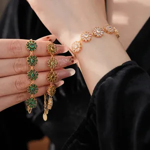 Vintage gold-plated flower bracelet set with emerald and yellow zircon crystals