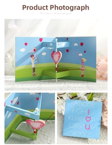 Detail of 3D pop-up greeting card featuring cartoon characters and love-themed paper art