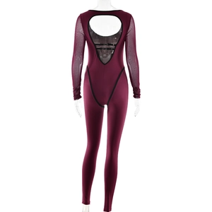 Macro view of burgundy athletic bodysuit featuring mesh sleeves and back cutout buckle