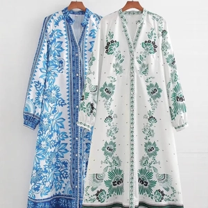 Floral print bohemian V-neck maxi dress with lantern sleeves and button-down detail