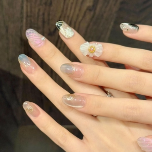 3D white flower press-on nails with pink shell texture and blue cat eye gradient finish