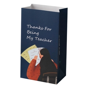 Navy blue teacher appreciation gift bag with thanks illustration and paper handles