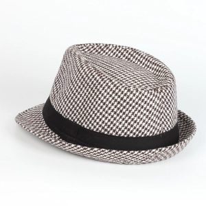 Detail view of the houndstooth pattern and matte black ribbon on this classic jazz fedora hat
