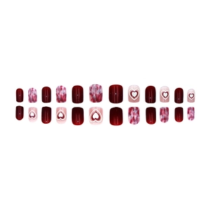 Short square press-on nails set with red marble patterns and sweet heart designs