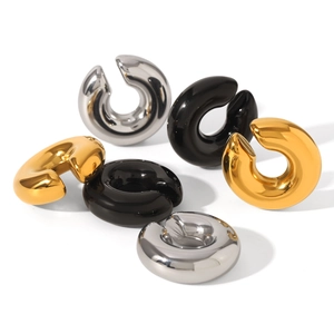 Minimalist C-shape stainless steel hoop earrings in gold, silver, and black polished finish