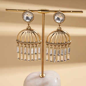 Vintage gold crystal tassel earrings with hollow round design and shimmering fringe