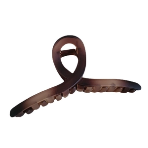 Elegant large gradient dark brown hair claw clip with twisted design on white background