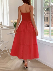 Red spaghetti strap midi dress featuring a pleated back and tiered ruffle skirt detail