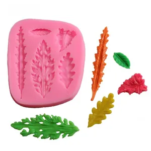 Macro shot of pink leaf silicone mold with detailed textures for fondant and chocolate cake